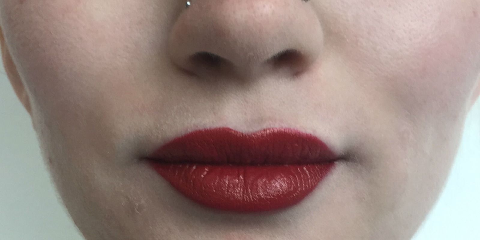 Keep Lipstick Off Your Teeth With This Easy Makeup Trick