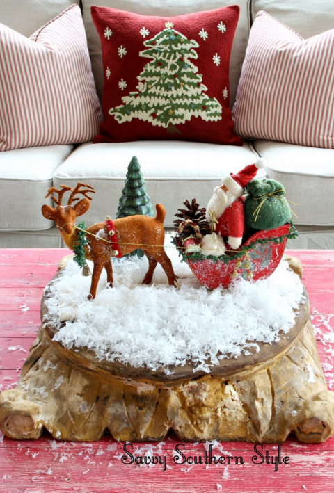 A miniature display of Santa Claus and his reindeer looks especially fun on some fake snow.
See more at Savvy Southern Style »