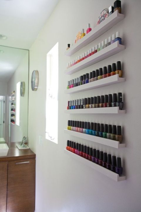 You already know that IKEA's picture ledges are super functional — and here's another idea that only further proves it. Six different rails stacked on a wall gives this simple bathroom salon-like style.<br />See more at Apartment Therapy »<br />