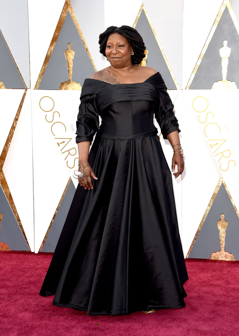 Whoopi Goldberg Shows Off Dragon Tattoo On Oscars Red Carpet Whoopi Goldberg Shows Off Huge Shoulder Tattoo At The Oscars