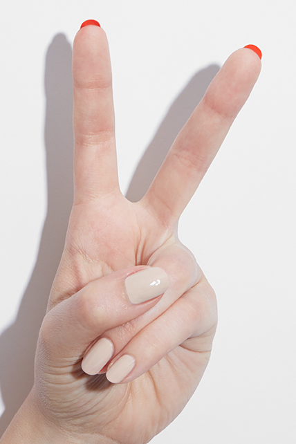 The top of your nails aren't the only part you can paint — your undersides can be incorporated, too! Play it cool and neutral in a nude nail color on top, then add a bright tangerine shade to the underside.
See more at Julep »