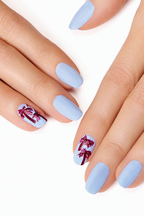 Palm tree nail art can look cartoonish, but when you use a delicate pastel base color and make your trees a chic shade of purple, they look more sophisticated and fun.
See more at Essie »