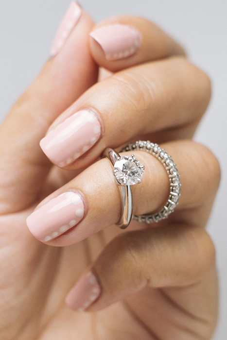 Summer nail art doesn't have to be bright to make a big impact. This blush-colored polish is pretty on its own, but the white dots around the edges make it really pop.
See more at Petite Peinture »