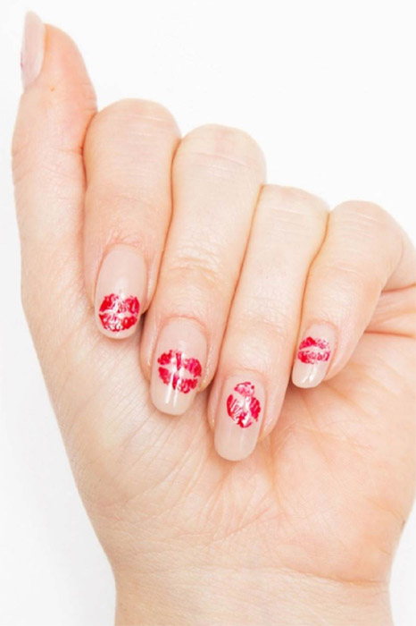 Make it look like someone — someone with very tiny lips — has planted one on each of your nails by painting slightly imperfect kiss marks with a red nail polish like OPI Big Apple Red ($10.50, amazon.com) on a nude backdrop.
</p><p>See more at Cosmopolitan&nbsp;»
</p><p>