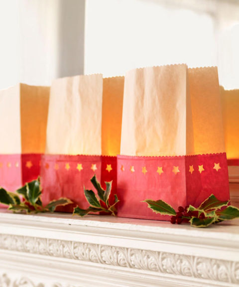 For luminarias, cut red paper bags in half with decorative scissors, and trim the tops of white or brown bags.