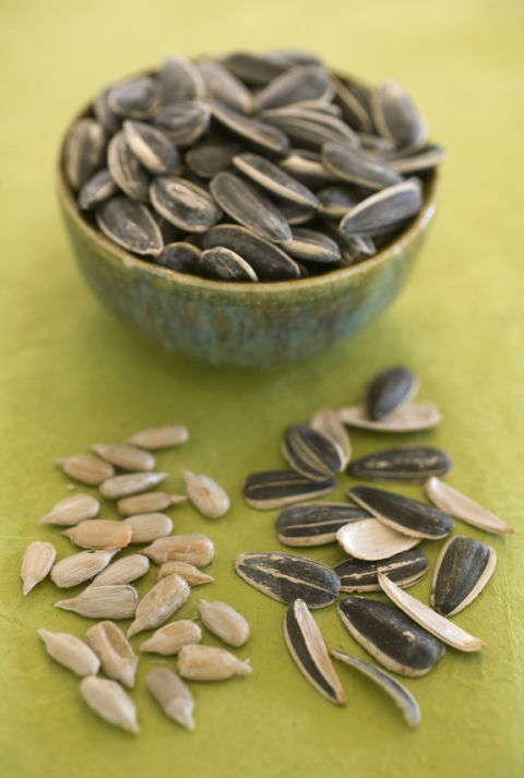 Nuts and seeds alike are packed with vitamin E, which helps protect our body's cells and give our skin a healthy glow. Plus, since vitamin E has also been linked to lowering the risk of heart disease, sprinkling sunflower seeds into salads, soups, sautés or eating a handful as a snack&nbsp;delivers an extra health perk. 