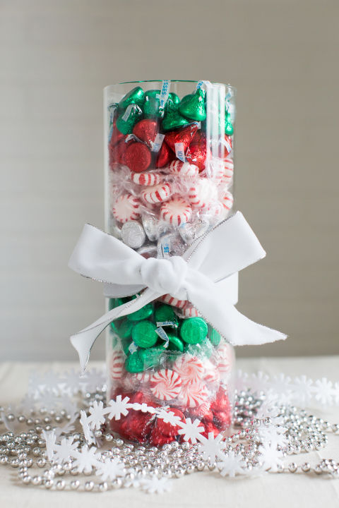 A bowl of treats sounds appealing, but you can take the presentation to the next level in just a few minutes. Separate red, green and silver-wrapped candy before layering in color-coded stripes. Get the tutorial » 